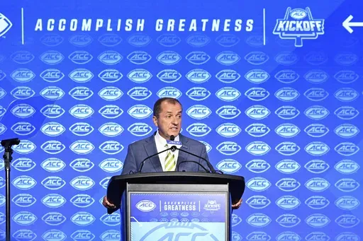 Atlantic Coast Conference commissioner Jim Phillips speaks during an NCAA college football news conference at the ACC media days, Monday, July 22, 2024, in Charlotte, N.C. (AP Photo/Matt Kelley, File)