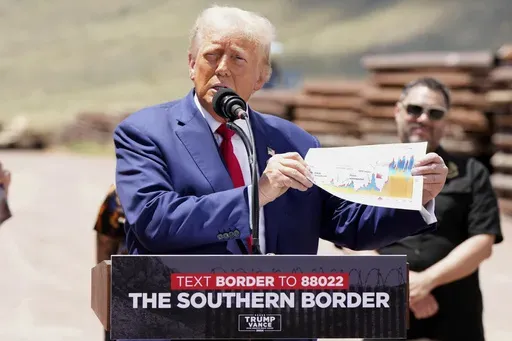 Former President Donald Trump speaks during a campaign event in front of the US-Mexico border, Thursday, Aug 22, 2024, in Sierra Vista, Arizona. (AP Photo/Rick Scuteri)