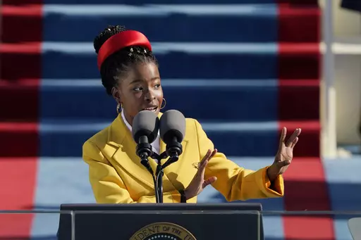 American poet Amanda Gorman recites a poem during the Inauguration of U.S. President Joe Biden at the U.S. Capitol on Jan. 20, 2021, in Washington. The poem written for Biden’s inauguration has been placed on a restricted list for elementary-aged students at a school in South Florida after a complaint by one parent. In a Facebook post on Tuesday, May 23, 2023, Gorman vowed to fight back. (AP Photo/Patrick Semansky, File)