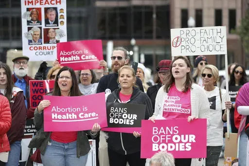 Supporters of Issue 1, the Right to Reproductive Freedom amendment, attend a rally held by Ohioans United for Reproductive Rights at the Ohio Statehouse in Columbus, Ohio, Sunday, Oct. 8, 2023. The Ohio Supreme Court, Friday, Dec. 15, has dismissed the state’s challenge to a judge’s order that has blocked enforcement of Ohio's near-ban on abortions for the past 14 months.(AP Photo/Joe Maiorana, File)