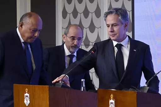 U.S. Secretary of State Antony Blinken, right, Egyptian Foreign Minister Sameh Shoukry, left, and Jordanian Deputy Prime Minister and Foreign Minister Ayman Safadi attend a press conference in Amman, Jordan, Saturday, Nov. 4, 2023. Blinken is making a new push to ease the plight of civilians. He met with Arab foreign ministers on Saturday in Jordan, the day after talks in Israel with Prime Minister Benjamin Netanyahu, who insisted there could be no temporary cease-fire until all hostages held by