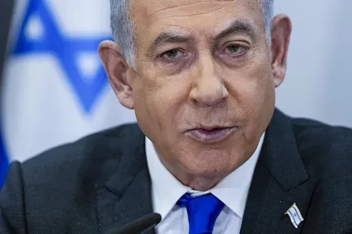 Israeli Prime Minister Benjamin Netanyahu chairs a cabinet meeting at the Kirya military base, which houses the Israeli Ministry of Defense, in Tel Aviv, Israel, on Dec. 24, 2023. (AP Photo/Ohad Zwigenberg, Pool, File)