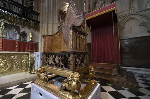 The Coronation Chair is seen inside Westminster Abbey in London, Wednesday, April 12, 2023, ahead of King Charles III coronation on May 6, 2023. The crown will be placed on Charles’ head as he sits in the Coronation Chair suspended over the Stone of Scone (pronounced “scoon”) — the sacred slab of sandstone on which Scottish kings were crowned. The chair has been part of every coronation since 1308. (Dan Kitwood/Pool Photo via AP, file)