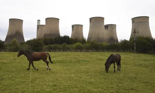 General view of Ratcliffe-on-Soar power station in Nottingham, England, Sunday, Sept. 29, 2024. The UK's last coal-fired power plant, Ratcliffe-on-Soar, will close, marking the end of coal-generated electricity in the nation that sparked the Industrial Revolution. (AP Photo/Rui Vieira)