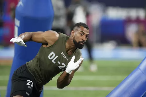 Pittsburgh defensive lineman Habakkuk Baldonado runs a drill at the NFL football scouting combine in Indianapolis, Thursday, March 2, 2023. Baldonado spent three years playing American football in Rome before ever setting foot on U.S. soil. Now, he’s hoping the become the next Pittsburgh protégé to make it big in the NFL. (AP Photo/Darron Cummings, File)