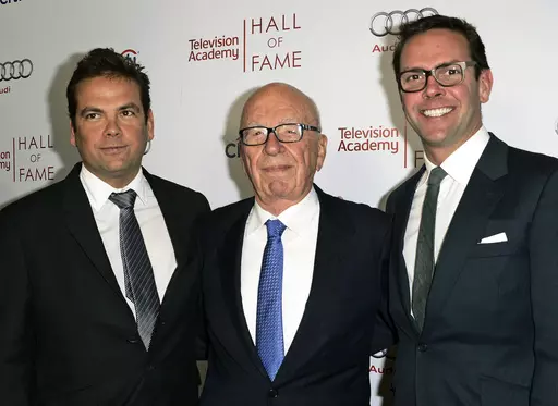 News Corp. Executive Chairman Rupert Murdoch, center, and his sons, Lachlan, left, and James Murdoch attend the 2014 Television Academy Hall of Fame in Beverly Hills, Calif., on March 11, 2014. Fox Corp. chief executive Lachlan Murdoch on Friday, April 21, 2023, dropped his defamation lawsuit against Australian news website Crikey, citing the Fox News settlement of a U.S. court case where the network agreed to pay almost $800 million over its lies involving the 2020 U.S. presidential election. (