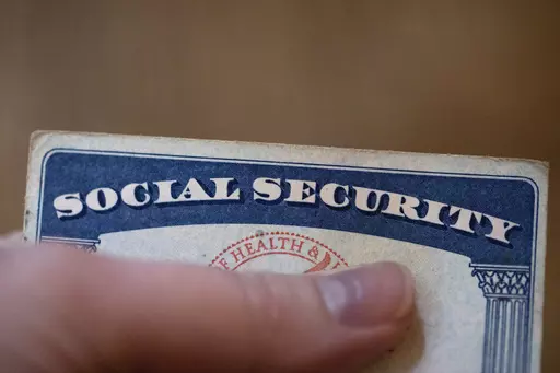 A Social Security card is displayed on Oct. 12, 2021, in Tigard, Ore. For people who rely on Supplemental Security Income, or SSI, getting married can result in reduced monthly benefits and a lower amount allowed for savings. Individual SSI recipients can own up to $2,000 in resources, while couples can have a combined $3,000. (AP Photo/Jenny Kane, File)
