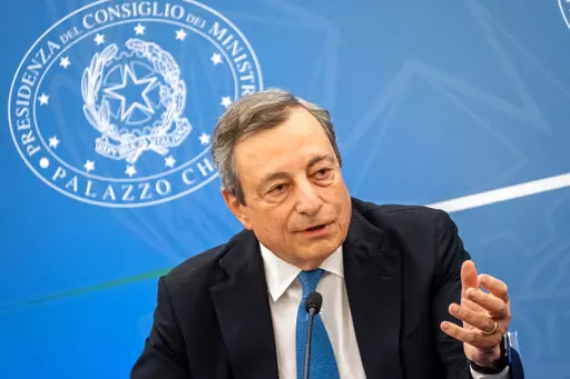 Italian Premier Mario Draghi meets the media in Rome, Tuesday, July 12, 2022. Premier Mario Draghi insisted Tuesday his government was able to continue working despite tensions with the 5-Star Movement, but he warned that it can’t function if coalition members make ultimatums. Draghi briefed reporters after meeting with unions on the government’s latest efforts to mitigate the effects of soaring inflation and high energy costs on workers, families and industries. (Mauro Scrobogna/LaPresse vi