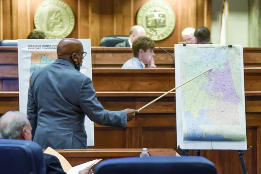 Sen. Rodger Smitherman compares U.S. Representative district maps during the special session on redistricting at the Alabama Statehouse in Montgomery, Ala., Nov. 3, 2021. The U.S. Supreme Court ruled Thursday, June 8, 2023, that Alabama’s U.S. House districts violated the federal Voting Rights Act by diluting the political power of Black voters.(Mickey Welsh/The Montgomery Advertiser via AP, File)