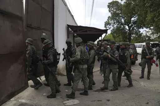 Soldiers raid the Tocorón Penitentiary Center, in Tocorón, Venezuela, Sept. 20, 2023. The Tren de Aragua gang originated at the prison. (AP Photo/Ariana Cubillos, File)
