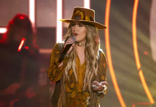 Lainey Wilson performs during the CMT Artists of the Year in Nashville, Tenn., on Wednesday, Oct. 12, 2022. The Louisiana-born artist was honored as breakout artist of the year at the CMT Artists of the Year special, airing Friday on CMT. (Nicole Hester/The Tennessean via AP)