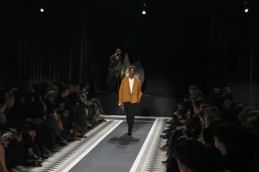A model wears a creation for the men's Lanvin Fall-Winter 2025-2026 collection, that was presented in Paris, Sunday, Jan. 26, 2025. (AP Photo/Michel Euler)