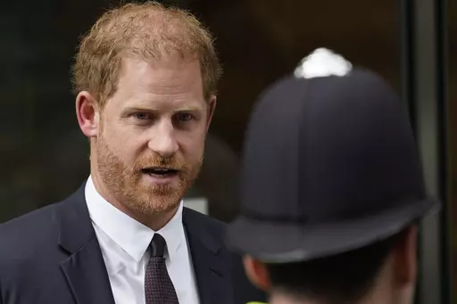 Prince Harry leaves the High Court after giving evidence in London, Tuesday, June 6, 2023. Prince Harry is challenging on Tuesday, Dec. 5, 2023, the British government’s decision to strip him of his security detail after he gave up his status as a working member of the royal family and moved to the United States. The Duke of Sussex said he wants protection when he visits home and claimed it's partly because an aggressive press jeopardizes his safety and that of his family. (AP Photo/Alberto Pe