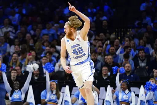 North Carolina's Brady Manek reacts during the first half of a college basketball game against St. Peter's in the Elite 8 round of the NCAA tournament, Sunday, March 27, 2022, in Philadelphia. (AP Photo/Chris Szagola)
