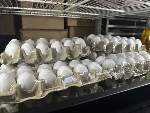 Cartons of eggs sit inside cooler at Norma's Sweets Bakery Tuesday, Feb. 11, 2025, in New Orleans. (AP Photo/Stephen Smith)