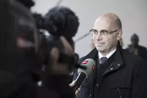 Philippe Currat, lawyer for Gambia's former Interior Minister Ousman Sonko, talks to the media after the conviction of her father, in front of the Federal Criminal Court of Switzerland in Bellinzona, Wednesday, May 15, 2024. Switzerland’s top criminal court has convicted Ousman Sonko for crimes against humanity over the repression by the west African country’s security forces against opponents of its longtime dictator, a legal advocacy group said Wednesday. (Maria Linda Clericetti/Keystone v