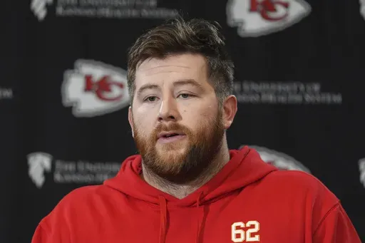Kansas City Chiefs guard Joe Thuney addresses the media before the team's NFL football practice Thursday, Jan. 23, 2025, in Kansas City, Mo. (AP Photo/Charlie Riedel)