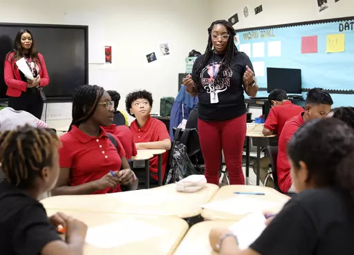 Jennifer Williams, center, teaches math at Tasby Middle School in Dallas, Texas, on Sep 15, 2023. (Jason Janik/The Dallas Morning News via AP)