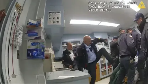 This image provided by the New York State Attorney General office shows body camera footage of correction officers beating a handcuffed man, Robert Brooks, 43, at the Marcy Correctional Facility in Oneida County, N.Y., on Dec. 9, 2024. (New York State Attorney General office via AP, File)