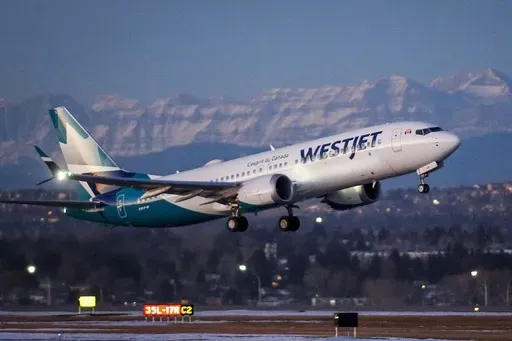 A westJet airplane takes off in Calgary, Alta., Jan. 21, 202. Mechanics at the Canadian airline WestJet say they are dropping plans to begin a strike now that the airline has agreed to resume negotiations on a new collective-bargaining agreement. Members of the Aircraft Mechanics Fraternal Association had been preparing to walk off the job on Thursday night. (Jeff McIntosh/The Canadian Press via AP, File)