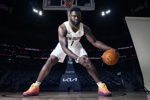 New Orleans Pelicans' Zion Williamson poses during the NBA basketball team's media day at the Smoothie King Center in New Orleans, Monday, Sept. 30, 2024. (Chris Granger/The Times-Picayune/The New Orleans Advocate via AP)