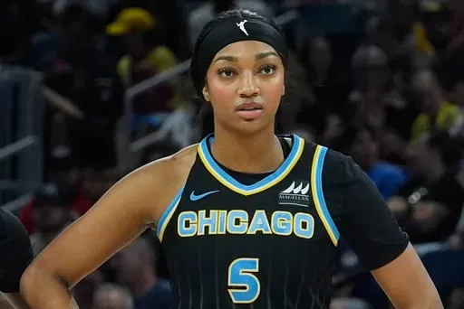 Chicago Sky forward Angel Reese watches during the second half of a WNBA basketball game, Friday, Aug. 30, 2024, in Chicago. (AP Photo/Erin Hooley, File)