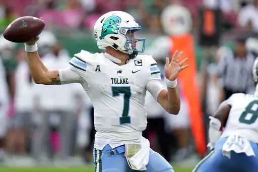 Tulane quarterback Michael Pratt throws a pass against South Florida during the first half of an NCAA college football game Saturday, Oct. 15, 2022, in Tampa, Fla. (AP Photo/Chris O'Meara)
