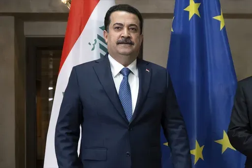 Iraqi Prime Minister Mohammed al-Sudani poses for a photo at the Munich Security Conference in Munich, Germany, Feb. 17, 2024. (Sven Hoppe/DPA via AP, Pool, File)