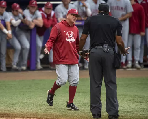 Alabama head coach Brad Bohannon, left, argues with umpire Joe Harris after being tossed from an NCAA college baseball game in the bottom of the second inning against LSU, Saturday, April 29, 2023, in Baton Rouge, La. The NCAA on Thursday, Feb. 1, 2024, handed down a five-year suspension as part of a 15-year show cause order against former Alabama baseball coach Brad Bohannon, effectively banning him from college coaching, after he provided information to a gambler who used it to make illegal wa
