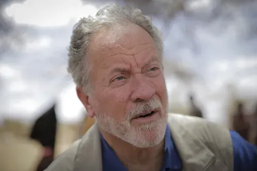 World Food Program chief David Beasley speaks to The Associated Press in the village of Wagalla in northern Kenya Aug. 19, 2022. Beasley is warning that without billions of dollars more to feed millions of hungry people, the world will see mass migration, destabilized countries, and starving children and adults in the next 12 to 18 months. (AP Photo/Brian Inganga, File)
