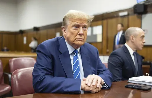 Former President Donald Trump awaits the start of proceedings on the second day of jury selection at Manhattan criminal court, April 16, 2024, in New York. (Justin Lane/Pool Photo via AP)