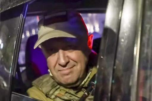 Yevgeny Prigozhin, the owner of the Wagner Group military company, looks from a military vehicle leaving an area of the HQ of the Southern Military District in a street in Rostov-on-Don, Russia, on June 24, 2023. Putin recounted to Kommersant his own version of a Kremlin event attended by 35 Wagner commanders, including the group's chief, Yevgeny Prigozhin, on June 29. That meeting came just five days after Prigozhin and his troops staged a stunning but short-lived rebellion against Moscow autho