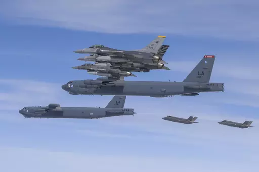 In this photo provided by the South Korean Defense Ministry, U.S. B-52H bombers, center, and F-16 fighter jets and South Korean Air Force F-35A fighter jets, right bottom, fly over the Korean Peninsula during a joint air drill in South Korea on April 14, 2023. The United States flew nuclear-capable bombers to the Korean Peninsula on Friday, June 30, in its latest show of force against North Korea, days after the North staged massive anti-U.S. rallies in its capital. (South Korea Defense Ministry