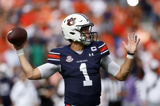 Auburn quarterback Payton Thorne throws a pass during the first half of an NCAA college football game against Vanderbilt, Saturday, Nov. 2, 2024, in Auburn, Ala. (AP Photo/ Butch Dill)