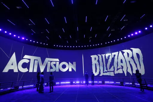 The Activision Blizzard Booth is shown on June 13, 2013, during the Electronic Entertainment Expo in Los Angeles. Microsoft’s plan to buy video game giant Activision Blizzard for $68.7 billion could have major effects on the gaming industry, transforming the Xbox maker into something like a Netflix for video games by giving it control of many more popular titles. But to get to the next level, Microsoft must first survive a barrage of government inquiries from various countries. An upcoming dec