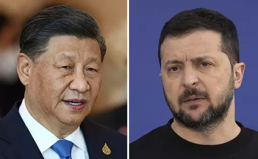 This combination of file photos shows China's President Xi Jinping, taken in Bangkok, Thailand, on Nov. 19, 2022, and Ukrainian President Volodymyr Zelenskyy taken outside Kyiv, Ukraine, on April 7, 2023. Chinese leader Xi talked Wednesday, April 26, 2023, with Ukrainian President Zelenskyy by phone and appealed for negotiations in Russia's war against his country, warning "there is no winner in a nuclear war," state media said, in a long-anticipated conversation after Beijing said it wanted to 