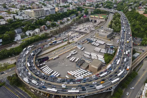People drive vehicles in and out of the Lincoln Tunnel, coming and going between midtown Manhattan in New York City and New Jersey, in Weehawken, New Jersey, on Friday, May 12, 2023. New Jersey has filed a federal lawsuit aimed at stopping New York's first-in-the-nation plan to charge big tolls to drive into the most visited parts of Manhattan, arguing that New Jersey residents and towns will bear the brunt of the higher tolls while receiving little benefit. (AP Photo/Ted Shaffrey, File)