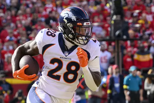 Denver Broncos running back Latavius Murray (28) runs with the ball during the first half of an NFL football game against the Kansas City Chiefs, Sunday, Jan. 1, 2023 in Kansas City, Mo. The Buffalo Bills signed running back Latavius Murray to a one-year contract on Monday, May 1, 2023, adding a veteran and productive presence to their relatively young backfield. The 33-year-old Murray has nine seasons of NFL experience and combined for 760 yards and six touchdowns split between Denver and New O