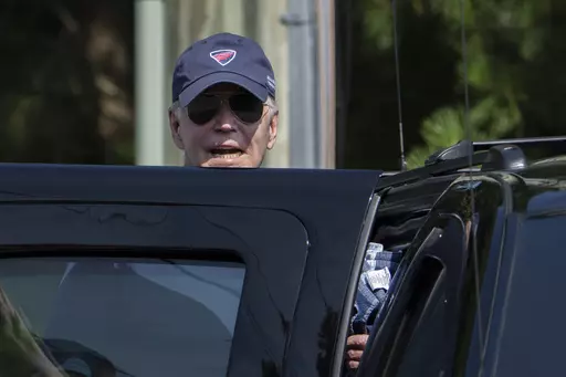President Joe Biden responds to reporters as he gets in to his presidential vehicle in Rehoboth Beach, Del., Wednesday, Aug. 2, 2023. (AP Photo/Manuel Balce Ceneta)