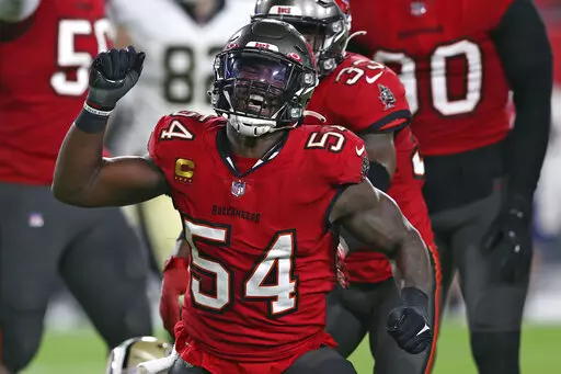 Tampa Bay Buccaneers inside linebacker Lavonte David (54) racts after sacking New Orleans Saints quarterback Taysom Hill during the first half of an NFL football game Sunday, Dec. 19, 2021, in Tampa, Fla. (AP Photo/Mark LoMoglio)