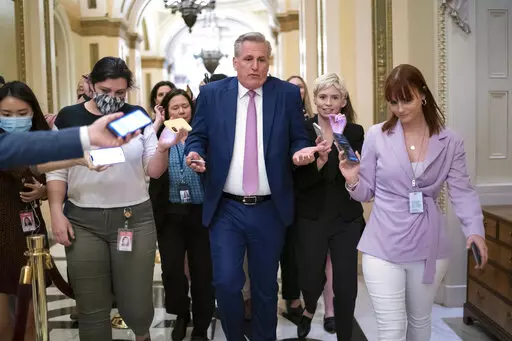 House Minority Leader Kevin McCarthy, R-Calif., heads to his office surrounded by reporters after House investigators issued a subpoena to McCarthy and four other GOP lawmakers as part of their probe into the violent Jan. 6 insurrection, at the Capitol in Washington, Thursday, May 12, 2022. The House Select Committee on the January 6 Attack has been investigating McCarthy's conversations with then-President Donald Trump the day of the attack and meetings that the four other lawmakers had with th
