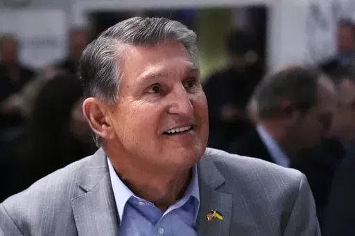 Sen. Joe Manchin, D-W.Va., smiles while being introduced during the 'Politics and Eggs' event, as part of his national listening tour, Friday, Jan. 12, 2024, in Manchester, N.H. As his second term ends as a U.S. senator, Manchin is still not a declared candidate for any office five months before the 2024 general election. But there’s still time to mull potential runs for governor, the Senate, and even the U.S. presidency. (AP Photo/Charles Krupa, File)