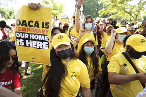 Susana Lujano, left, a dreamer from Mexico who lives in Houston, joins other activists to rally in support of the Deferred Action for Childhood Arrivals program, also known as DACA, at the U.S. Capitol in Washington on June 15, 2022. A federal appeals court Wednesday, Oct. 5, 2022, ordered a lower court review of Biden administration revisions to DACA, a program preventing the deportation of hundreds of thousands of immigrants brought into the United States as children. The ruling, for now, leav