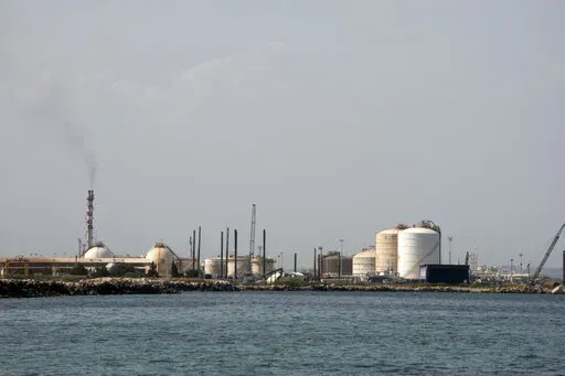 An external view of the ISAB refinery in Priolo-Gargallo near Syracuse, Sicily, Tuesday, May 31, 2022. The ISAB, owned by Russia’s Lukoil, employs 1,000 people directly and another 2,500 in related activities. In an ironic turn, Italy has increased its imports of Russian oil in a period when the rest of Europe has been slashing its purchases from Moscow, even before the sanctions. That’s because banks have refused to take the risk of extending credit to Russia-controlled ISAB that would allo