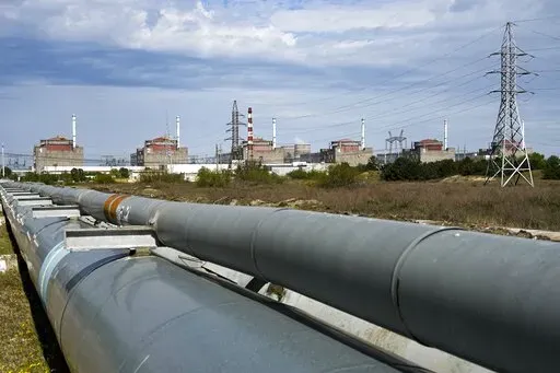 A view of the Zaporizhzhia Nuclear Power Station, in Enerhodar, Zaporizhzhia region, in territory under Russian military control, southeastern Ukraine, on May 1, 2022. The plant, that has been surrounded by Russian forces, lost power Wednesday morning, Oct. 12, 2022, when a Russian missile damaged a distant electrical substation, increasing the risk of radiation disaster, according to the plant's operator. (AP Photo/File)