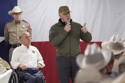 Incoming U.S. Border Czar Tom Homan, speaks to state troopers and national guardsmen, accompanied by Texas Gov. Greg Abbott, at a facility on the U.S.-Mexico border, in Eagle Pass, Texas, Nov. 26, 2024. (AP Photo/Eric Gay, File)