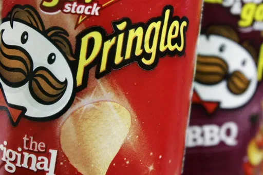 In this April 5, 2011 file photo, Pringles chips are seen in a posed photo at a West Bath, Maine grocery store. (AP Photo/Pat Wellenbach, File)