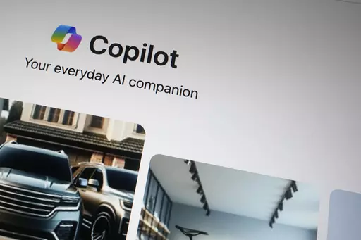 A Copilot page showing the incorporation of AI technology is shown in London, Tuesday, Feb. 13, 2024. A Microsoft engineer is sounding an alarm Wednesday, March 6, 2024, about offensive and harmful imagery he says is too easily made by the company’s artificial intelligence image-generator tool. (AP Photo/Alastair Grant, File)