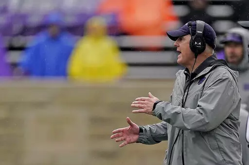 Kansas State head coach Chris Klieman talks to his players during the second half of an NCAA college football game against Missouri Saturday, Sept. 10, 2022, in Manhattan, Kan. (AP Photo/Charlie Riedel)