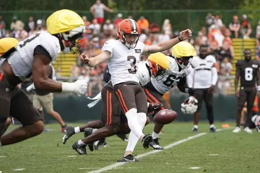 FILE -Cleveland Browns' Cade York (3) kicks during an NFL football camp, Tuesday, Aug. 1, 2023, in Berea, Ohio. The Browns' confidence in Cade York could be fluttering like one of his recent kicks. Cleveland's second-year kicker, who struggled for much of his rookie season, missed his second field-goal attempt of the preseason on Friday night, Aug. 11, 2023 in the Browns' 17-15 loss to the Washington Commanders.(AP Photo/Sue Ogrocki, File)